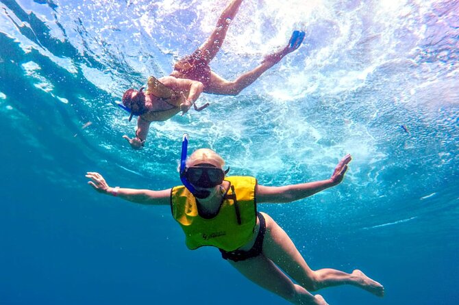 ATV Mud Kicking and Snorkeling by Boat in Cozumel - Lunch and open bar at Tortugas Beach Club, what is included