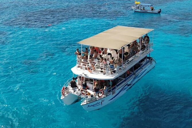 Catamaran in Cozumel with snorkeling at El Cielo and open Bar - Double-deck catamaran ride in Cozumel: comfort, space, and a small group