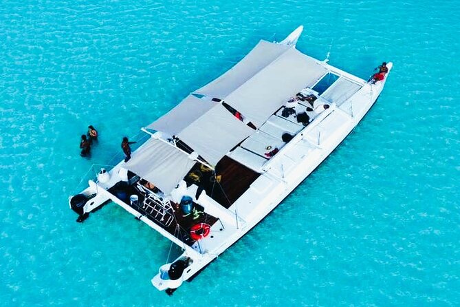 Catamaran Snorkel Adventure to El Cielo and The Money Bar Beach - Guides and onboard vibe: the human part you should expect