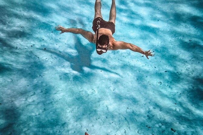 Cozumel Catamaran Tour: Snorkel at Top Reefs & Open Bar - El Cielito Beach: lunch, drinks, and the party continues