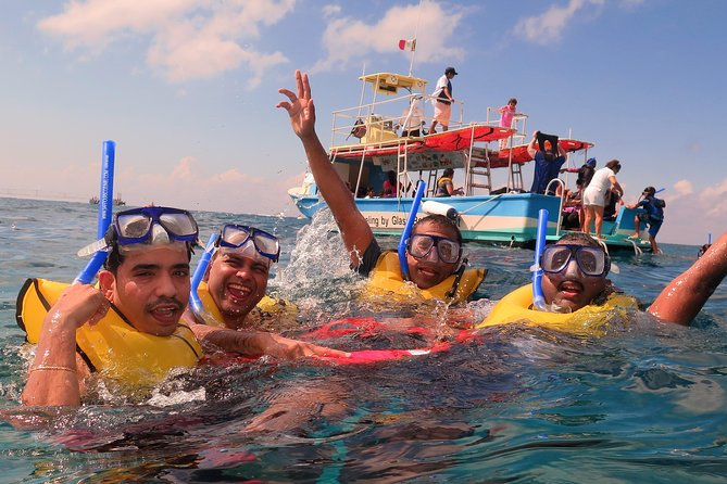 Cozumel Coral Reef Snorkeling by Glass Bottom Boat with Guide - Snorkeling gear, rules, and how the guides keep things calm
