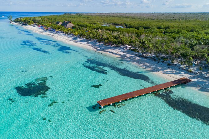 Cozumel: KUZÁ Beach Pass with Buffet, Open Bar & Activities - Entering KUZÁ: Wristband Check-In, Waiver, and First-Row Seating