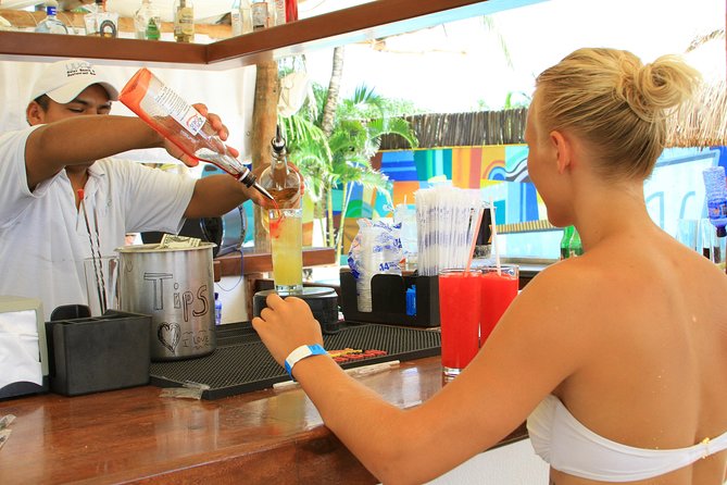 Playa Uvas Open Bar Exclusive Pass - Playa Uvas beach club amenities: pool, hammocks, fish spa, and Wi-Fi