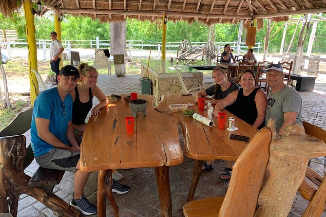 Private Cozumel Cave and Ruin Exploration Tour with Mexican Lunch - El Mirador: lookout views, artisan huts, and oceanfront lunch