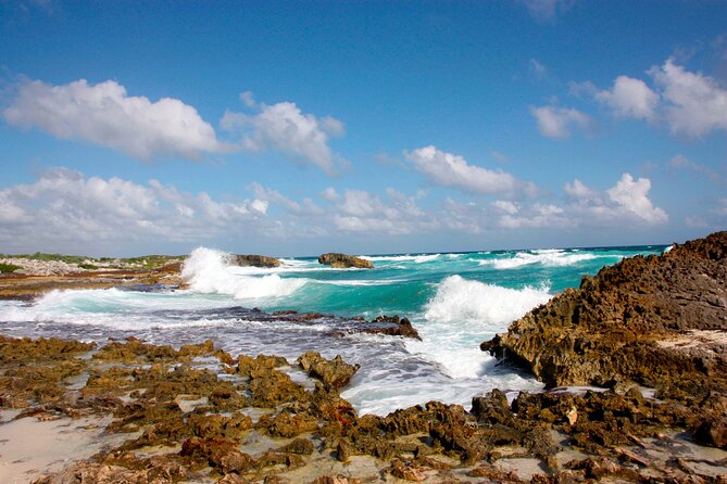 Private Cozumel Jeep and Jade Cavern Cenote Tour - El Mirador viewpoint: rock formations and long coastline photos
