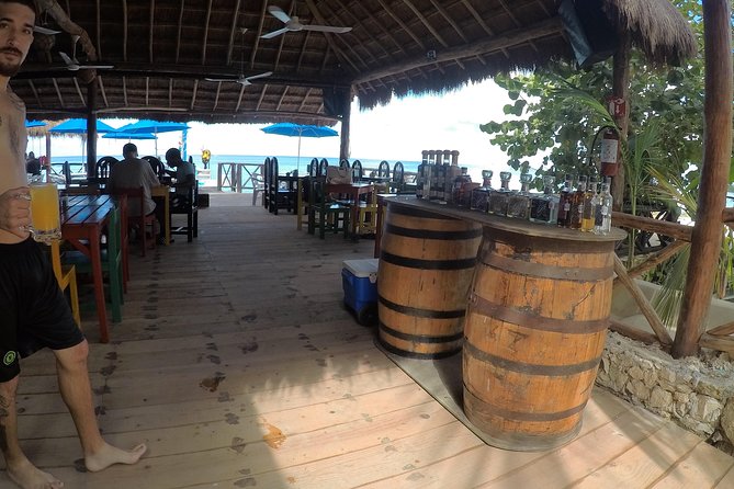 Snorkeling and Beach Club Access in Cozumel with Lunch - Beach club time after snorkeling: relaxation, extra swims, and rocky edges