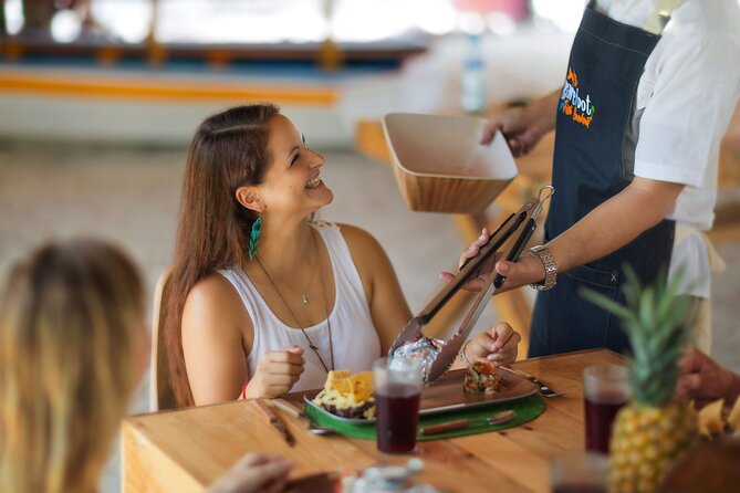 Tikinxic Barefoot Fish Guided Cookout Experience in Cozumel - Snacks, margaritas, and the end-of-meal Xtabentun moment