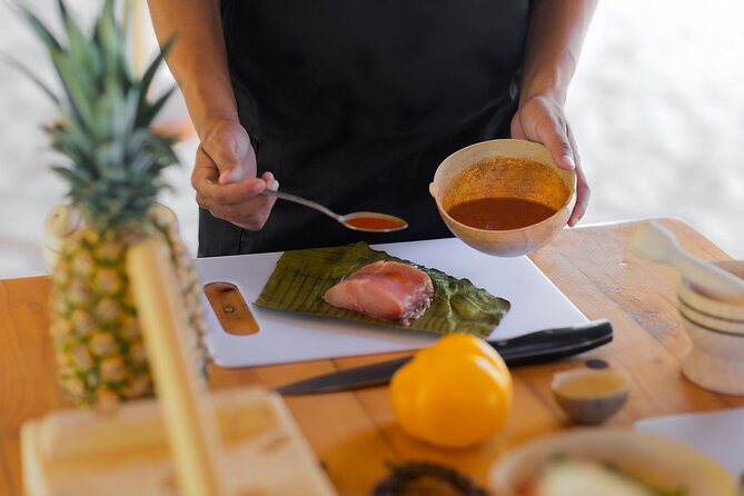 Tikinxic Barefoot Fish Guided Cookout Experience in Cozumel - The cooking part: Tikinxic fish, plantain leaves, and a Yucatan seasoning focus