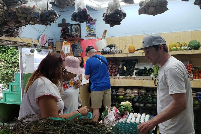 Traditional Family Kitchen in Cozumel - Choosing your pibil-style main, chicken, pork, or fish